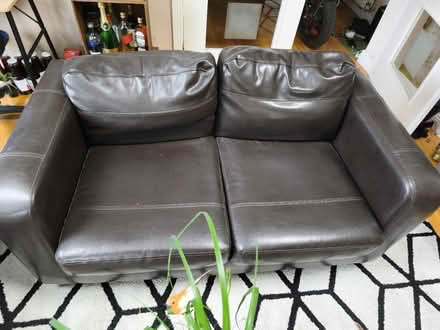 Photo of free 2-Seater Black Leather Sofa (Swords) #1