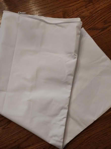 Photo of free NEW pillow protector (Odenton) #1