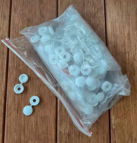Photo of free Small bag of screw caps & covers (Malvern Link WR14) #1