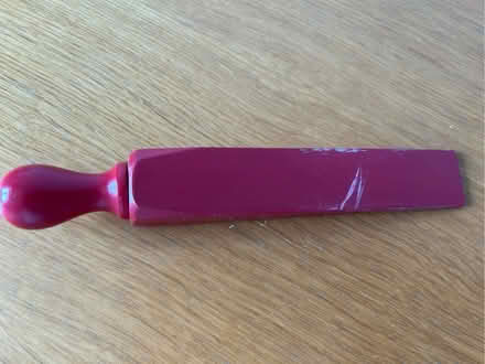 Photo of free Red wooden doorstop (Barkham RG41) #1