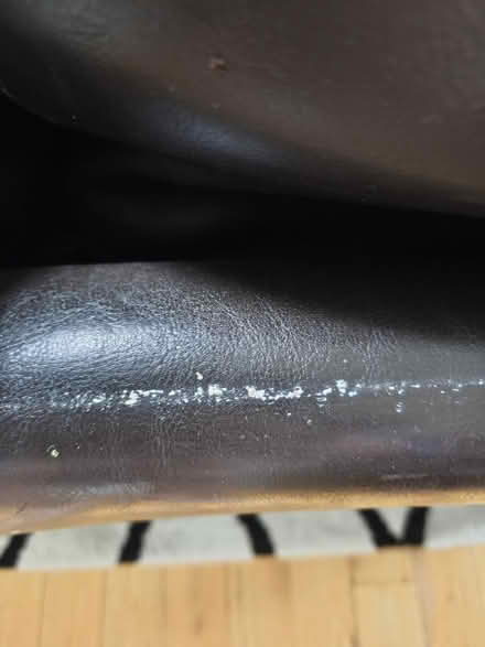 Photo of free 2-Seater Black Leather Sofa (Swords) #3