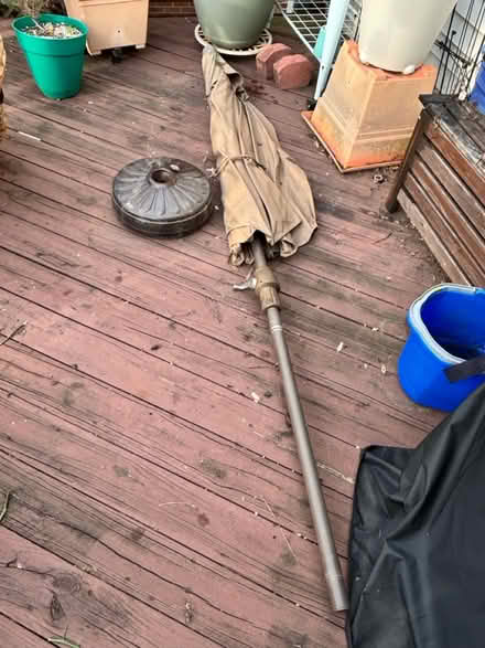 Photo of free Patio umbrella - 10 ft open + base (1st St & Veirs Mill Rd) #1