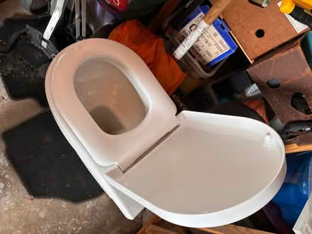 Photo of free A toilet, sink and oil filled radiator (New Hartley NE25) #1