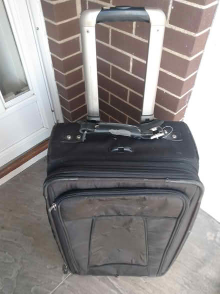 Photo of free 2 Suitcases on wheels by Travelpro (Near Baseline Rd. & Clyde Ave.) #2