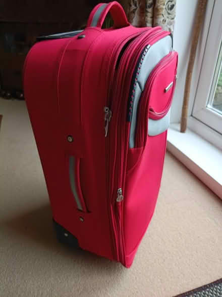 Photo of free Small suitcase - 2 wheels (Newton St Cyres) #1