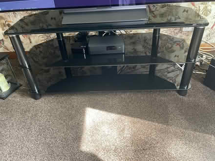 Photo of free Black glass tv stand (SM6) #2