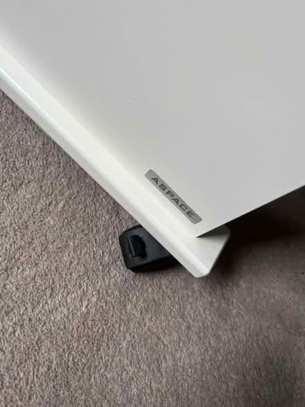 Photo of free White wooden desk on wheels (Woking GU22) #4