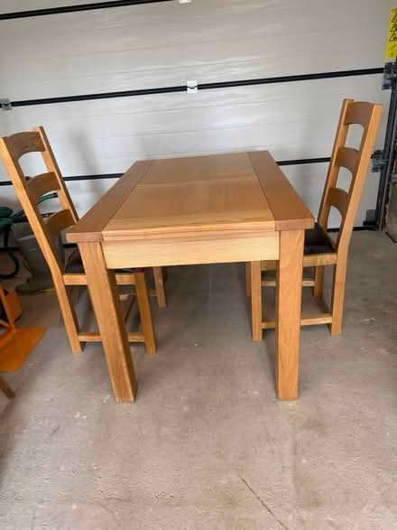 Photo of free Kitchen/dining table + 2 chairs (Glusburn) #1