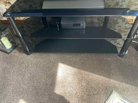 Photo of free Black glass tv stand (SM6) #1