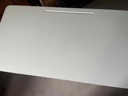 Photo of free White wooden desk on wheels (Woking GU22) #2