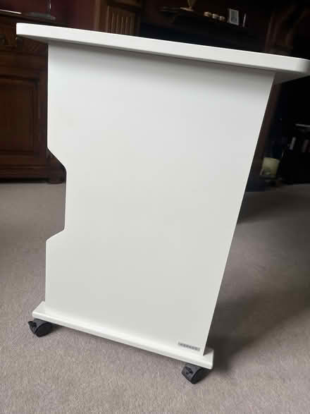 Photo of free White wooden desk on wheels (Woking GU22) #3