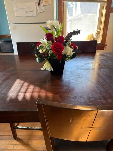 Photo of free Tall wooden dining room table (South Chicago) #1