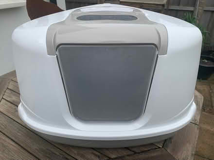 Photo of free Corner cat litter house with entry flap (Wheathampstead AL4) #1