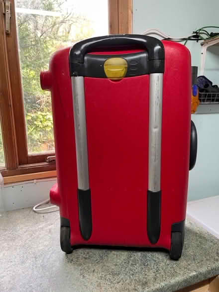 Photo of free Red Samsonite suitcase (Pulborough) #1