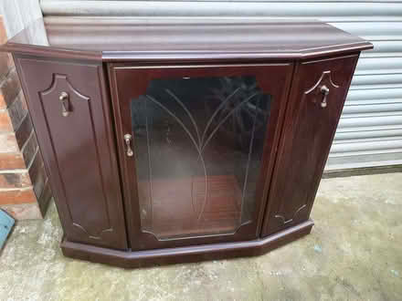 Photo of free Mahogany tv unit with storage on wheels (Howdon NE28) #1