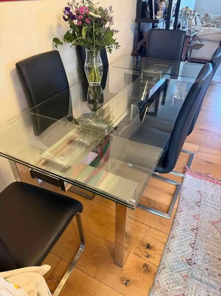 Photo of free Glass table seats 8 + 6 chairs (RH19) #1