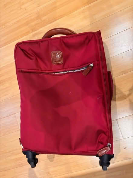 Photo of free Red carry-on suitcase (Whitley Bay NE26) #1
