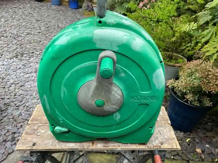 Photo of free Hozelock enclosed hose reel (Belper DE56) #1