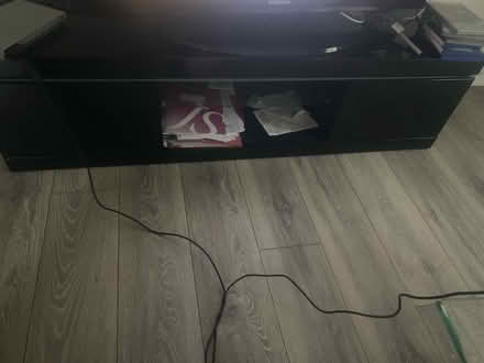 Photo of free Black TV Stand w/ two cabinets (Radcliffe M26) #1