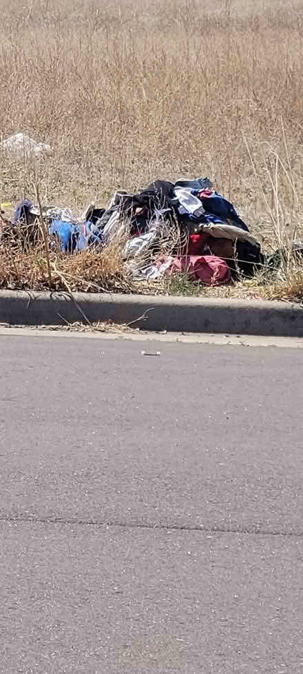 Photo of free HUGE pile of kids clothes (66th and Yampa) #1