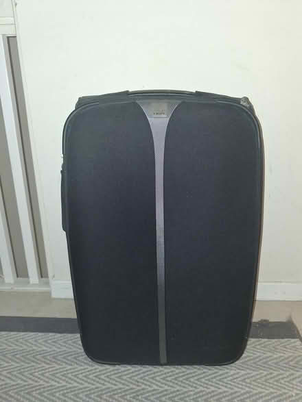 Photo of free Large suitcase (GU21 St. John's, Woking) #1