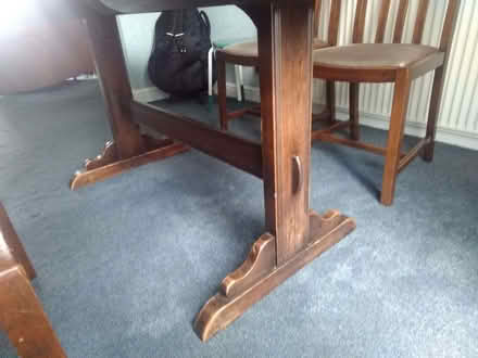 Photo of free Ercol solid oak table with 4 chairs of unknown make (Burncross S35) #2