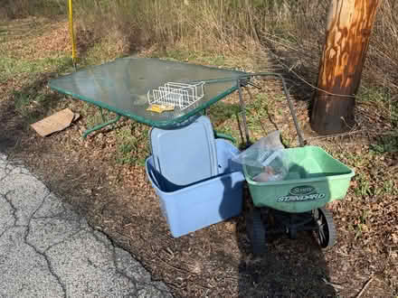 Photo of free on Curb Patio table Scott spreader (Montgomery) #1