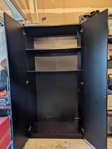 Photo of free IKEA Kallax closet with 4 shelves (North Laurel) #2