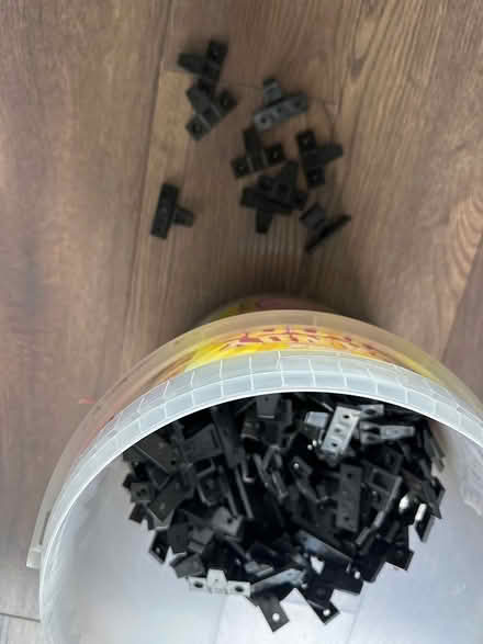 Photo of free Black plastic brackets (Crosby) #1