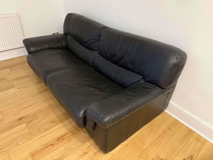 Photo of free Black leather sofa - MUST BE COLLECTED THIS WEEKEND! (Chiswick W4) #1