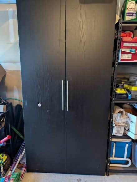 Photo of free IKEA Kallax closet with 4 shelves (North Laurel) #1