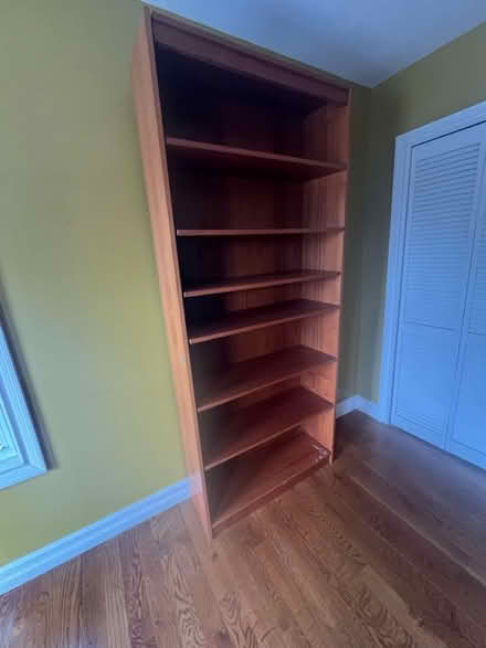 Photo of free Tall book shelf (Woodmere, NY) #1