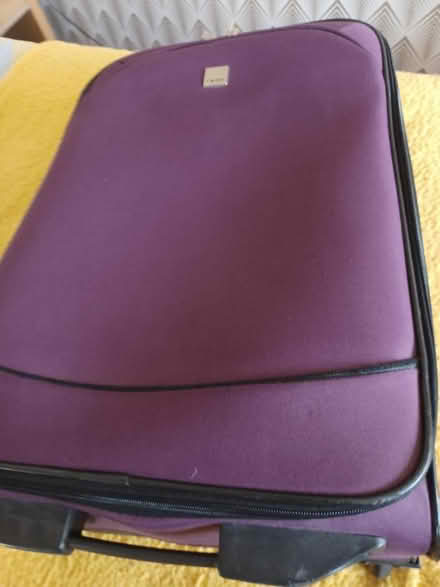Photo of free Medium purple Tripp suitcase (Hollingbury BN1) #1