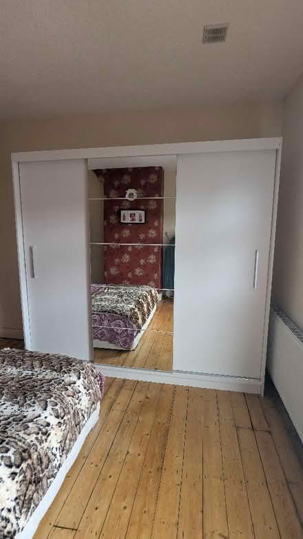 Photo of free 3 door white Wardrobe (Reddish M18) #1