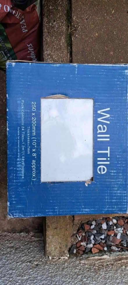 Photo of free 6 & a half boxes of new white tiles (Exeter EX1) #1