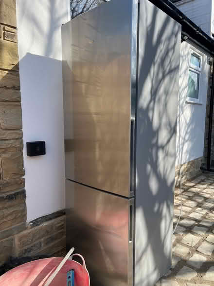 Photo of free Large grey Bosch fridge freezer (Calverley LS28) #1
