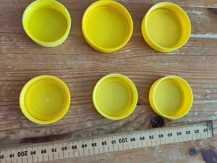 Photo of free Yellow plastic lids from marmite jars - junk modelling? (Henleaze Ward BS9) #2