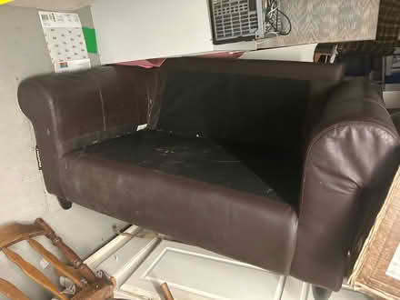 Photo of free 2 seater brown leather sofa (OL11 Rochdale) #1