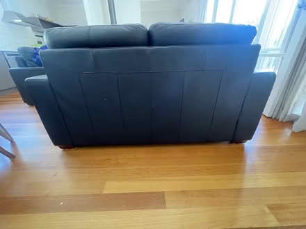 Photo of free Black leather couches (Inverloch) #1