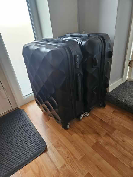 Photo of free Two medium size suitcases (WF14) #1