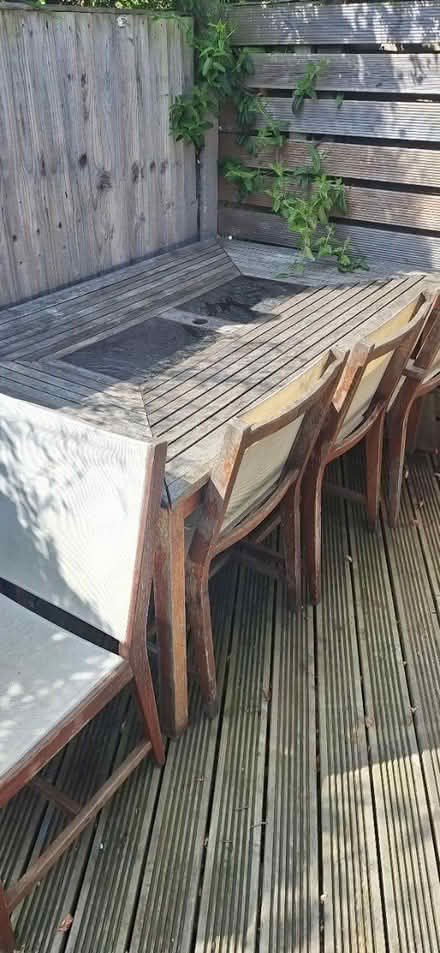 Photo of free 6 seater wooden table and chairs (Wem) #2