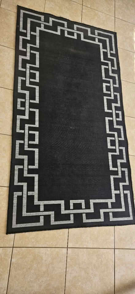Photo of free Black rug (Hoddesdon EN11) #1