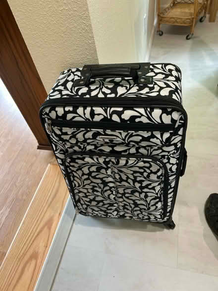 Photo of free Med size rolling suitcase (Arden Manor) #1