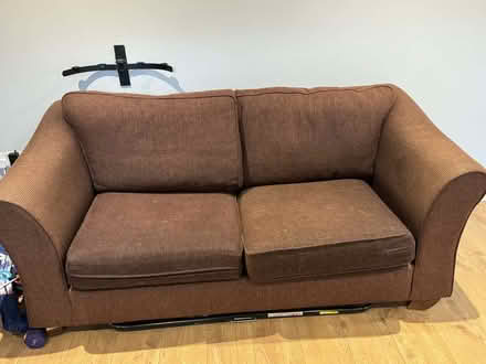 Photo of free Bed settee, brown and very comfy. ideal for a bedsit. (Penrith CA11) #1