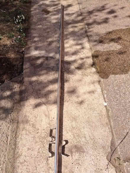 Photo of free Silver/chrome extendable curtain pole with brackets (Eastham CH62) #1