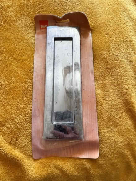 Photo of free Still sealed chrome letterbox plate (Colchester CO4) #1