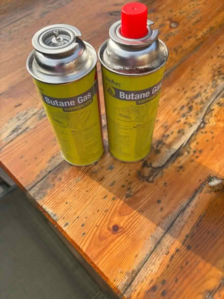 Photo of free Four butane gas canisters 227g each (Comberton DY10) #3