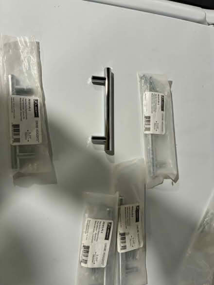 Photo of free Cabinet drawer pulls (S. 26th St. & S. Ives St) #1