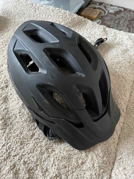 Photo of free Bicycle (black) helmet. (New Duston) #2