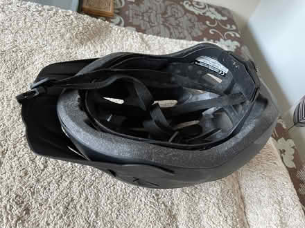 Photo of free Bicycle (black) helmet. (New Duston) #1